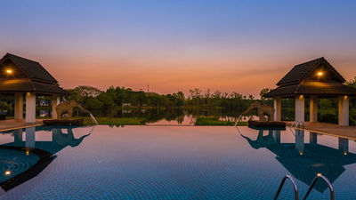 Tawa Ravadee Resort, WorldHotels Distinctive, is a serene Thai-style hotel in Prachinburi, Thailand, surrounded by picturesque rice fields.