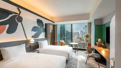 Guests enjoy a panoramic view of the city at the new Canopy by Hilton Osaka Umeda.