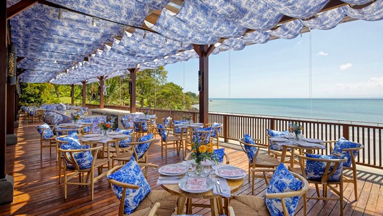 Dior takes over Sundara Beach Club, plastering its iconic print over new furnishings.