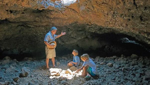 Children engage in a cave exploration as part of the programming at Mauna Lani, Auberge Resorts Collection. Children engage in a cave exploration as part of the programming at Mauna Lani, Auberge Resorts Collection.
