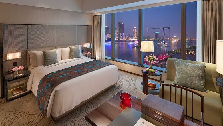 Mandarin Oriental Pudong Shanghai’s Deluxe River View room.