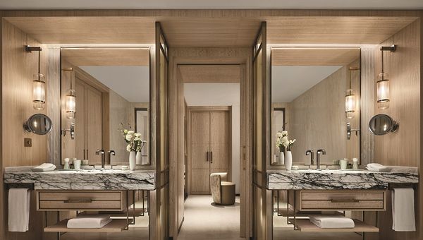 The spacious bathroom with his-and-hers vanities. The spacious bathroom with his-and-hers vanities.