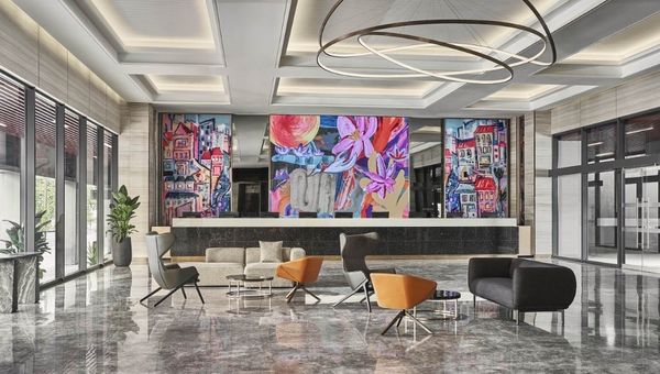 The hotel’s lobby features artwork by local artist Ripple Root, depicting Singapore’s iconic shophouses. The hotel’s lobby features artwork by local artist Ripple Root, depicting Singapore’s iconic shophouses.