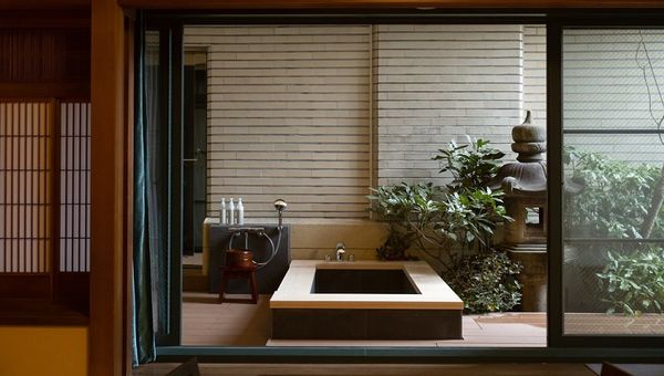 The hotel’s traditional Japanese rooms feature an outdoor bath.