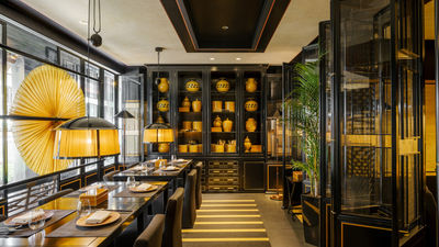 The black, gold and yellow interiors of Yellow Pot.