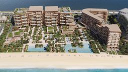 The Alba features ultra-luxury residences, expansive terraces, a private wellness centre, panoramic views, exclusive beachfront hospitality, and innovative architecture by Zaha Hadid Architects.