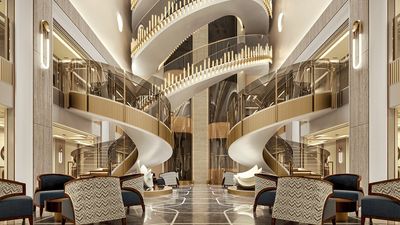 The Starlight Atrium is a central public space aboard Seven Seas Prestige, designed as an elegant gathering point for guests onboard.