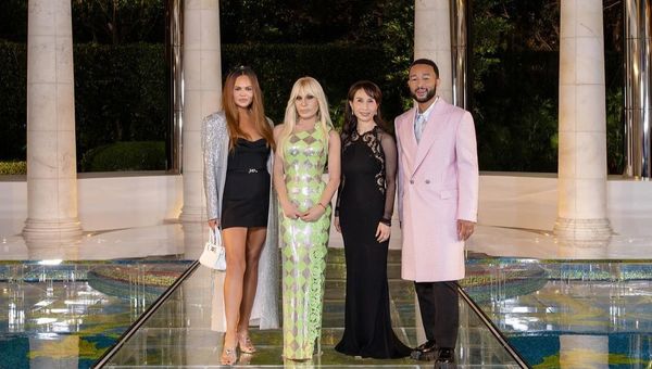 Chrissy Teigen, Donatella Versace, Daisy Ho and John Legend at Palazzo Versace Macau’s pool.