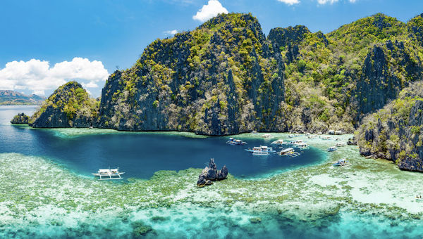 Shot in the Philippines: Aerial view of the beautiful lagoons and limestone cliffs typically found in Coron, Palawan.