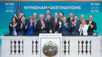 Robinson (second from right, front row) pictured at the ringing of the bell at the NYSE with the Wyndham Destinations senior leadership team.