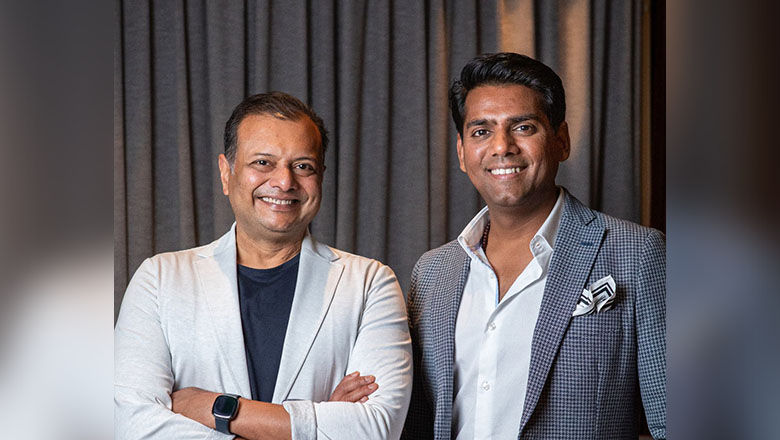 Dave Baswal (right) takes the mantle of CEO from founder Girish Jhunjhnuwala (left).