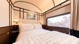 Suite guests receive butler service, in-room dining, a curated bar and Bollinger Champagne served throughout the trip.