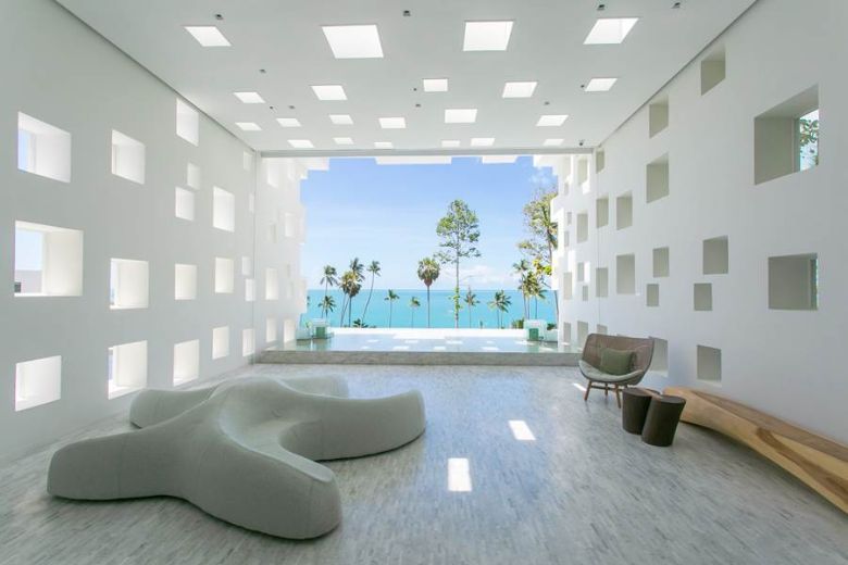 The design-driven resort offers 140 rooms, such as this Regency Suite Bedroom.