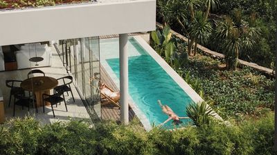 Villas offer infinity pools and Indian Ocean views.