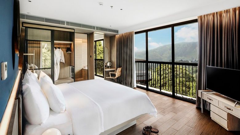The Botanica Suite offers views of Mount Pangrango and the lush virgin pine forest nearby.