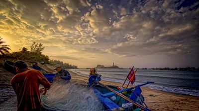 Guests at Azerai Ke Ga Bay can explore the local fishing community.