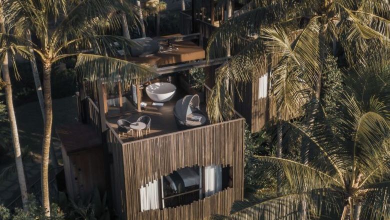 This treehouse villa in Bali shrouded by coconut trees offers a secluded hideaway for couples looking to escape the hustle and bustle of city life.