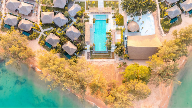 JATI features 82 one- and two-bedroom villas, Khmer-inspired design, private pools, wellness treatments, diverse dining, recreational activities, and family-friendly facilities on a secluded Cambodian island retreat.