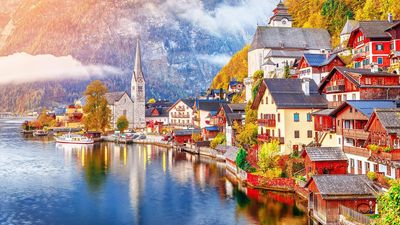 Hallstatt authorities recently erected fences to block popular photo spots, but quickly removed them due to public outcry.