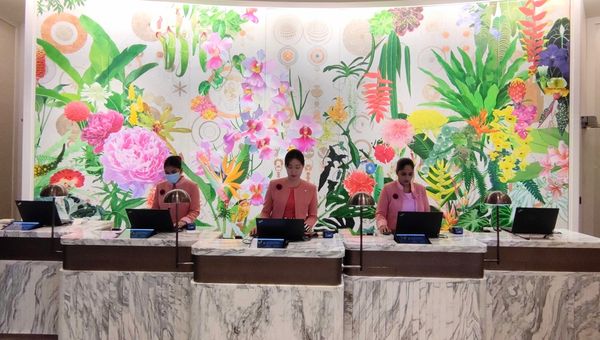 The captivating floral mural commissioned for the reception desk. The captivating floral mural commissioned for the reception desk.