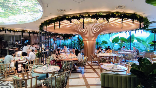 Embu, the all-day dining spot, takes cues from the evergreen tembusu, showcasing stylised timber frames and leafy canopies. Embu, the all-day dining spot, takes cues from the evergreen tembusu, showcasing stylised timber frames and leafy canopies.