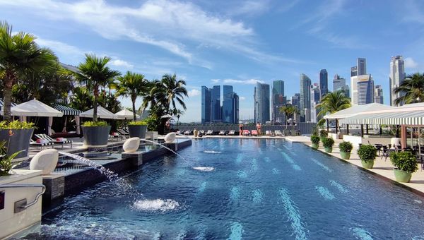 The hotel's pool offers panoramic city skyline views. The hotel's pool offers panoramic city skyline views.