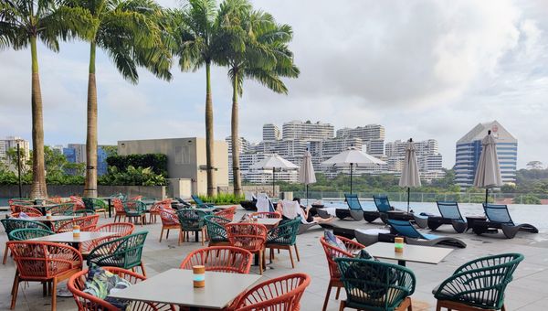 The infinity pool at Momentus Hotel Alexandra looks out to the stunning architectural marvel that is The Interlace.