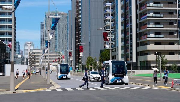 Automated buses circle the Olympic Village and can drop athletes off at nine different stops. Automated buses circle the Olympic Village and can drop athletes off at nine different stops.