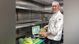 Uniworld chef utilising Leanpath food waste tracking system onboard.