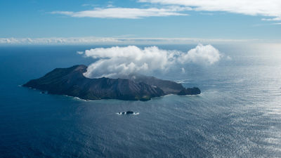 A volcanic eruption on White Island killed 22 people and severely injured many others.