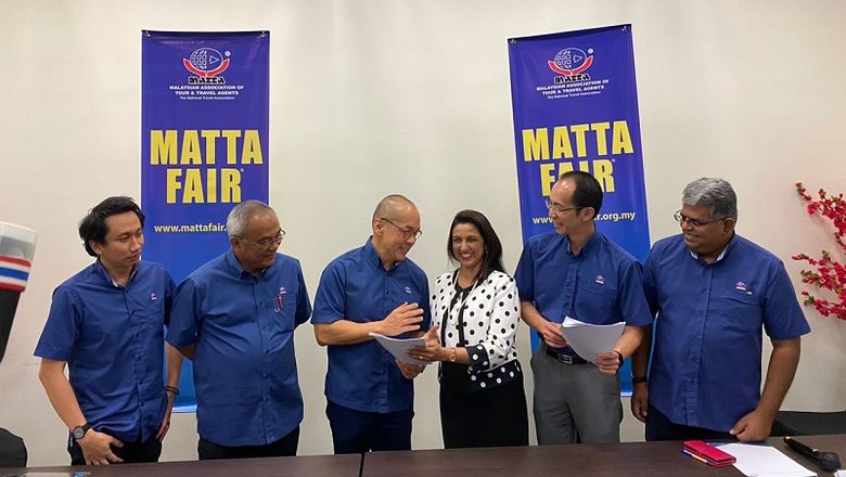 MATTA Fair March 2023 organising committee members Mohammad Faeez Bin Mohamad Fadhlillah, Datuk Hamzah Rahmat, Rocky Kho, Nigel Wong, and Ganneesh Ramaa, together with MITEC's Mala Dorasamy (centre).