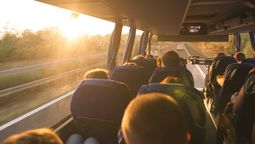 Despite predictions of decline, seat-in-coach tours remain popular for budget-friendly, social, and authentic travel experiences, appealing to all age groups.