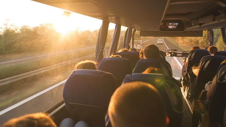 Despite predictions of decline, seat-in-coach tours remain popular for budget-friendly, social, and authentic travel experiences, appealing to all age groups.