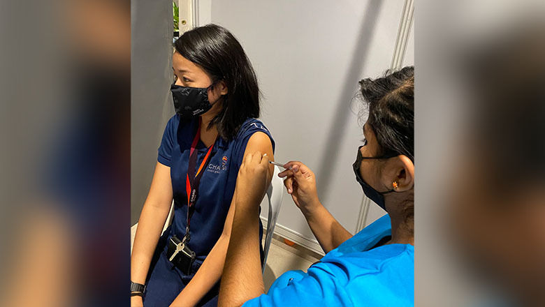 Air crew and frontline airport workers receive their Covid-19 vaccinations at Changi Airport.