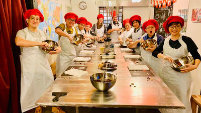Winning agents having a fun time learning how to make chocolate in Interlaken.