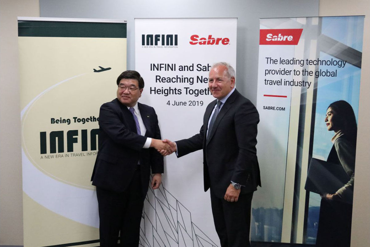 Infini CEO Kimio Uemura with Todd Arthur, VP, Asia Pacific of Sabre Travel Network at the signing ceremony on June 5.