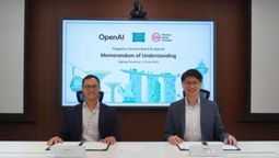 Oliver Jay, managing director of International, OpenAI and  (right) Jordan Tan, chief technology officer, Singapore Tourism Board at the MOU signing