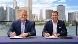 Jason Liberty, chairman and CEO of Royal Caribbean Group, and Adam Stewart, executive chairman of Sandals Resorts, mark the signing of an agreement of the landmark partnership.