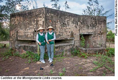 Caddies at the Montgomerie Links course.