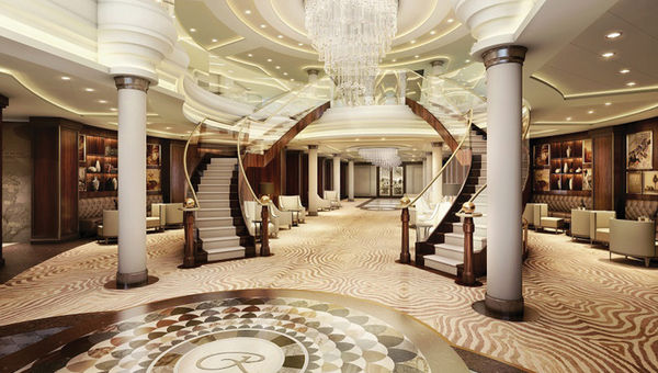 The Seven Seas Explorer's lobby features twin etched-glass staircases and a cascading crystal chandelier. The Seven Seas Explorer's lobby features twin etched-glass staircases and a cascading crystal chandelier.