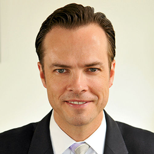 PwC's Scott Berman and Deloitte's Guy Langford Travel Weekly