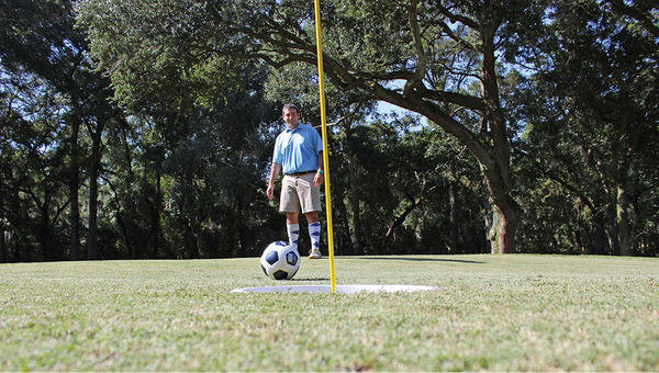A FootGolf player at the Westin Hilton Head. FootGolf is played with a regulation soccer ball on shortened holes with 21-inch-diameter cups. A FootGolf player at the Westin Hilton Head. FootGolf is played with a regulation soccer ball on shortened holes with 21-inch-diameter cups.