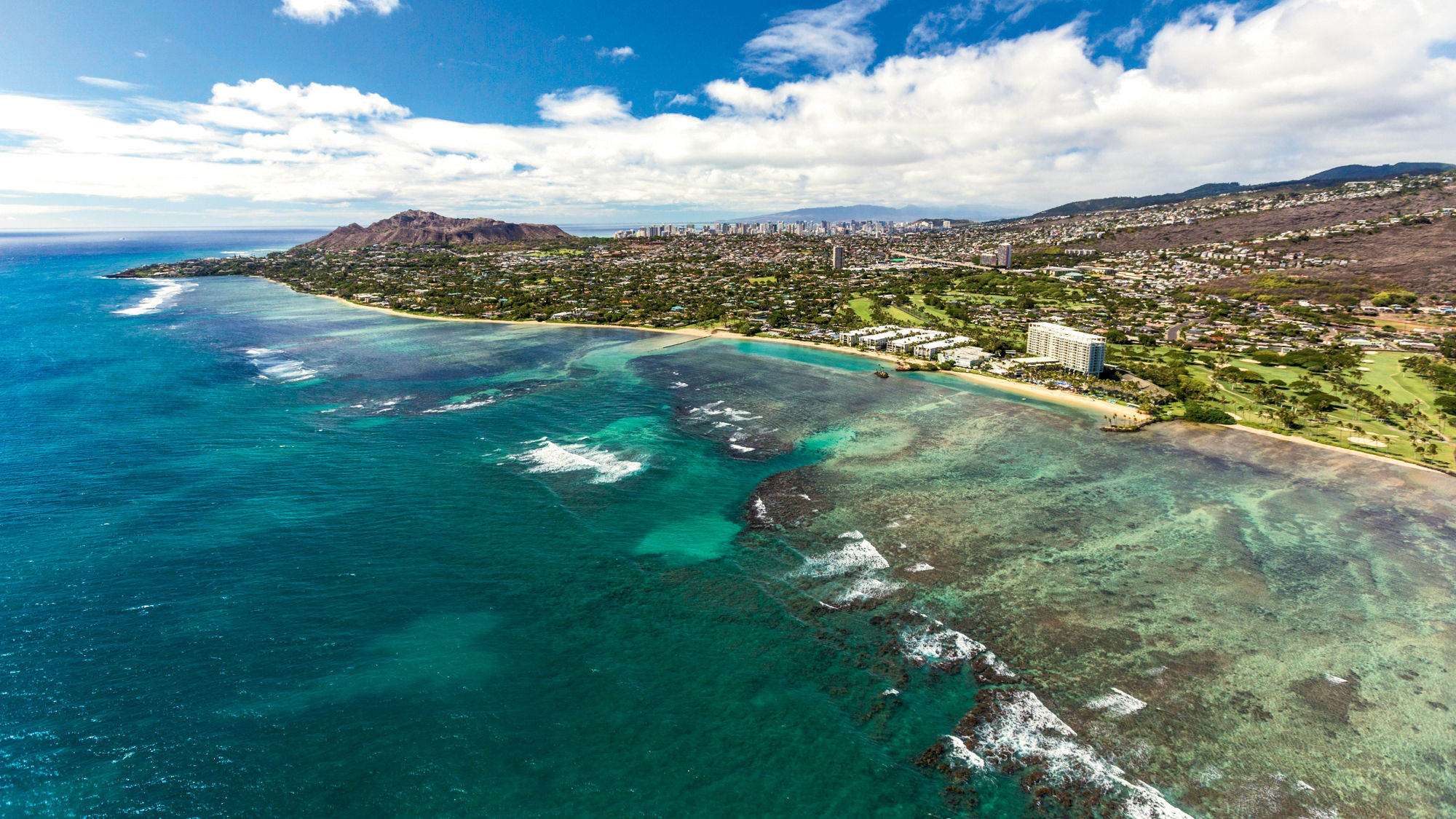 A view of Oahu’s south coast and the Kahala Hotel & Resort.