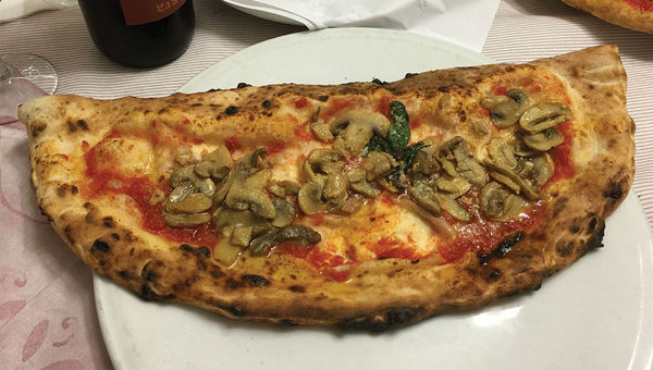 A margherita pizza, the finished product. A margherita pizza, the finished product.