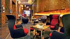 A steady climb in visitors has sparked a flurry of hotel development in Chicago as hoteliers introduce brands with a predominantly overseas presence or try out entirely new concepts. Pictured here, the lobby of the Radisson Blu Aqua.