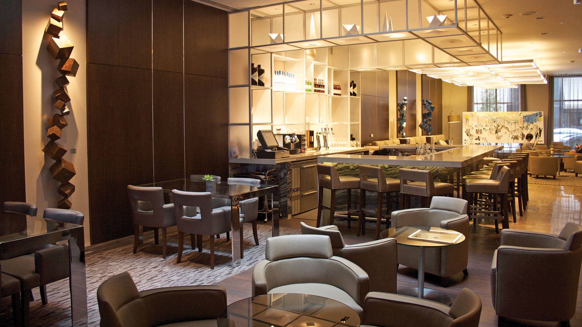 The AC Lounge at the AC Hotel New Orleans Bourbon Street offers an enticing selection of cocktails and bites.