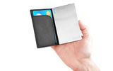Ultra-thin (it is about the size of a credit card), the Justin Slim Power Bank portable power source (2000 mAH) has an attractive brushed metal finish and comes with a synthetic leather carrying case that itself has a storage compartment for a real credit card.