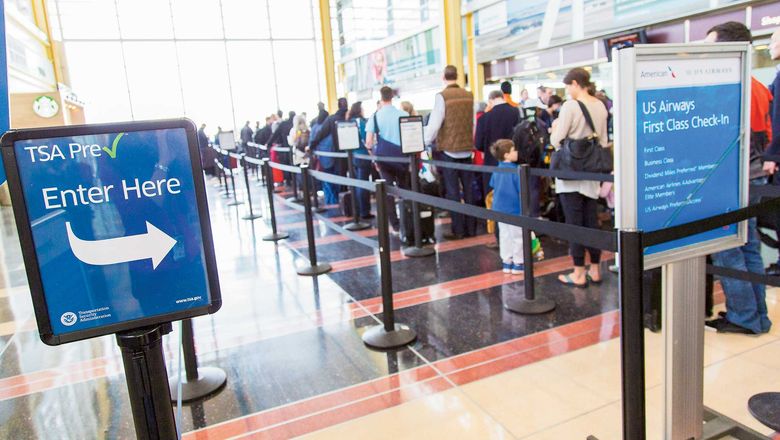 A TSA PreCheck line at an airport. The first international TSA PreCheck screening checkpoint has opened in Nassau.