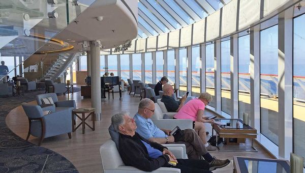 The Explorer's Lounge and its panoramic windows. The Explorer's Lounge and its panoramic windows.