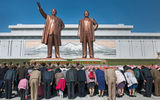 It's been over 60 years since the signing of the Korean Armistice Agreement, but recent events illustrate that North and South Korea are not any closer to a true or lasting peace. Still, there are those on both sides of the DMZ who are trying to bring about a detente. Their weapon of choice: tourism. Upon returning recently from North Korea, award-winning photographer and travel writer Mark Edward Harris filed these exclusive images. Pictured here, North Koreans bow to the newly unveiled statues of Kim Il Sung and Kim Jong Il in Pyongyang at the Mansudae Grand Monument.